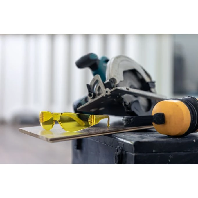 An image featuring safety equipment items that symbolize the Power Tool Cleaning Guide