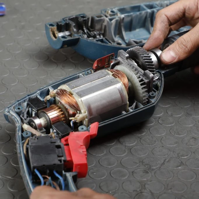 An image depicting maintenance procedures for power tool motors